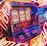 A vibrant scene featuring a classic slot machine with bright neon lights surrounding it. The slot machine displays symbols like 'Bar' and '7' and is set in a lively arcade environment. Reflections and colorful lighting add a sense of excitement and motion.
